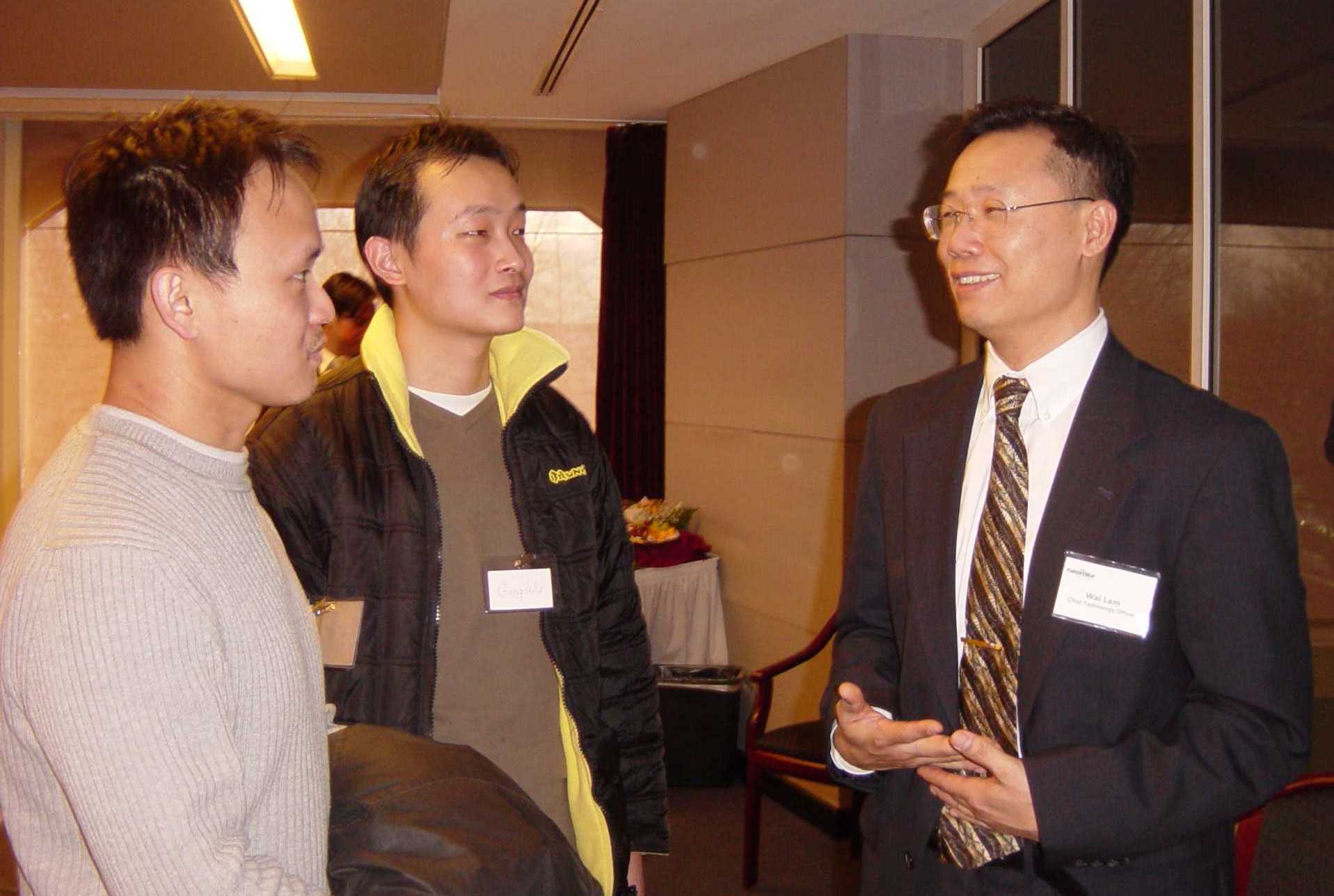 FalconStor VP of Engineering and SBU alumnus Wai Lam with SBU computer science students